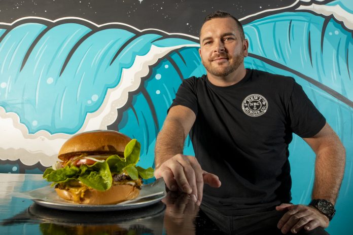 man with large burger