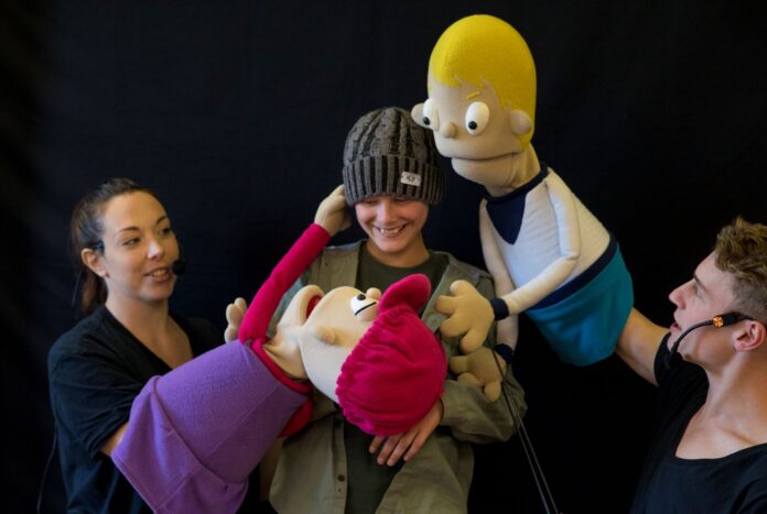 Oli Novak with the Camp Quality puppeteers at Hunter School of Performing Arts.
