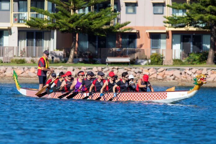 people rowing in Dragon Boat