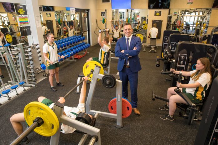 St Philip’s Christian College principal Darren Cox in gym