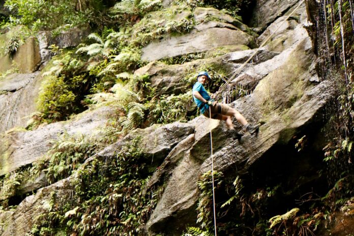 man Abseiling down the Gap Creek Falls in the Watagans