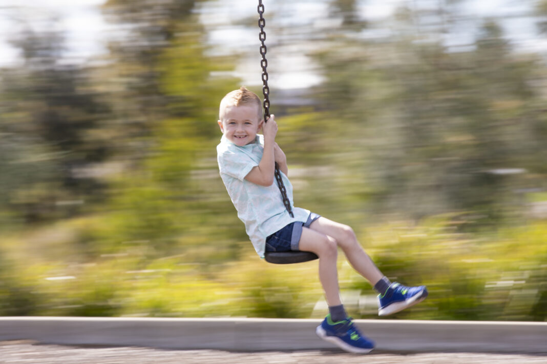 kid on a swing