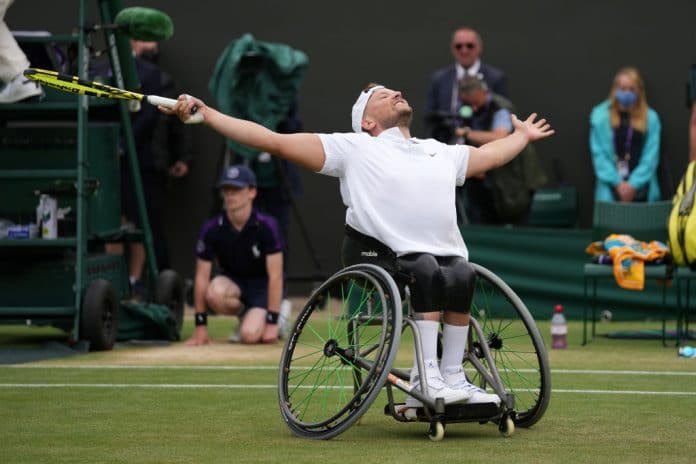 LONDON, ENGLAND - JULY 10: Dylan Alcott of Australia celebrates after winning his Quad Wheelchair Singles Final match against Sam Schroder of Netherlands on Day Twelve of The Championships - Wimbledon 2021 at All England Lawn Tennis and Croquet Club on July 10, 2021 in London, England. (Photo by Mike Hewitt/Getty Images)