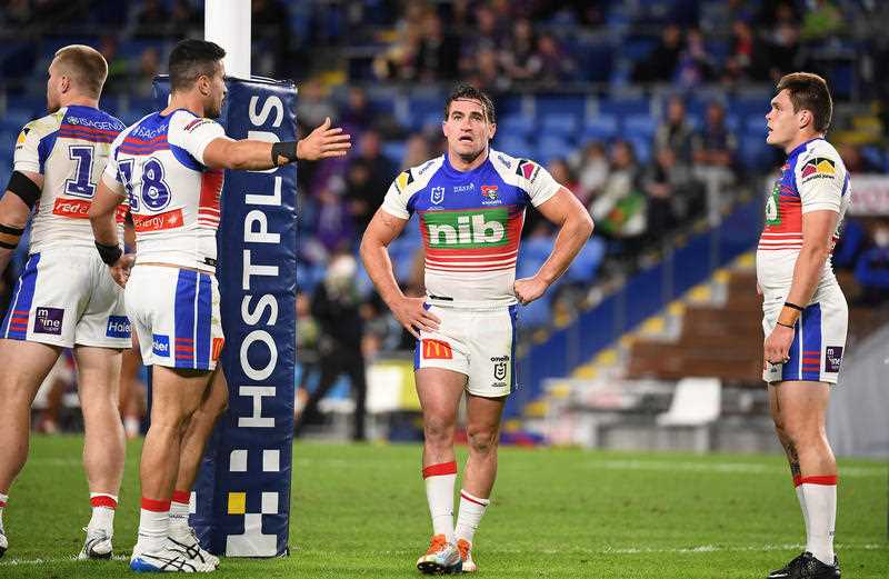 Connor Watson of the Knights looks on following a Storm try during the NRL Round 18 match between Melbourne Storm and Newcastle Knights at CBus Stadium on the Gold Coast
