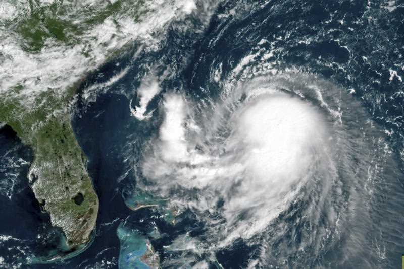 A satellite image shows tropical storm Henri in the Atlantic Ocean off the US East Coast