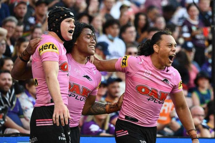 Panthers Brian To’o (C) celebrates after scoring a try during the NRL Preliminary Final match between Melbourne Storm and Penrith Panthers at Suncorp Stadium in Brisbane, Saturday, September 25, 2021