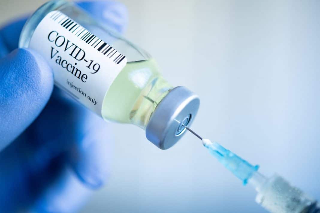 needle seen entering COVID-19 vaccine