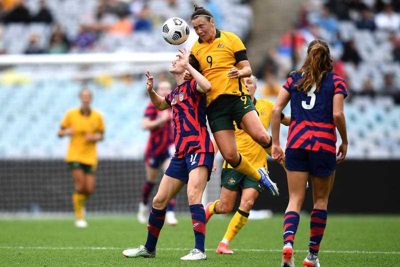 Caitlin Foord of the Matildas competes to head the ball with Andi Sullivan of the USWNT during the international friendly match between Australia and the US Women’s National Team at Stadium Australia in Sydney, Saturday, November 27, 2021.