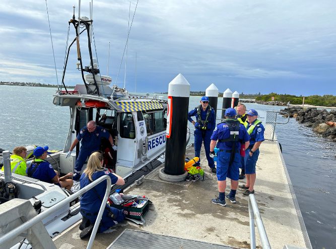Two men rescued after boat capsizes off Swansea Heads | Newcastle Weekly